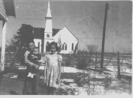 Photo of early day Reagan Texas residents, Leonard, Jean, and Richard Kubiak